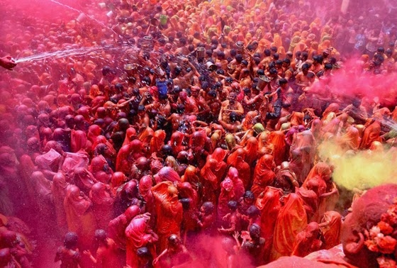 Men and Women Participate in Huranga Celebrations at The Dauji Temple
